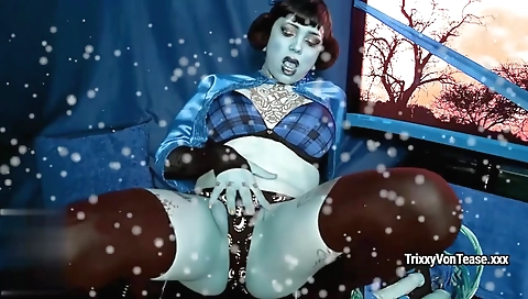 Hot blonde does a sexy strip standing with cum